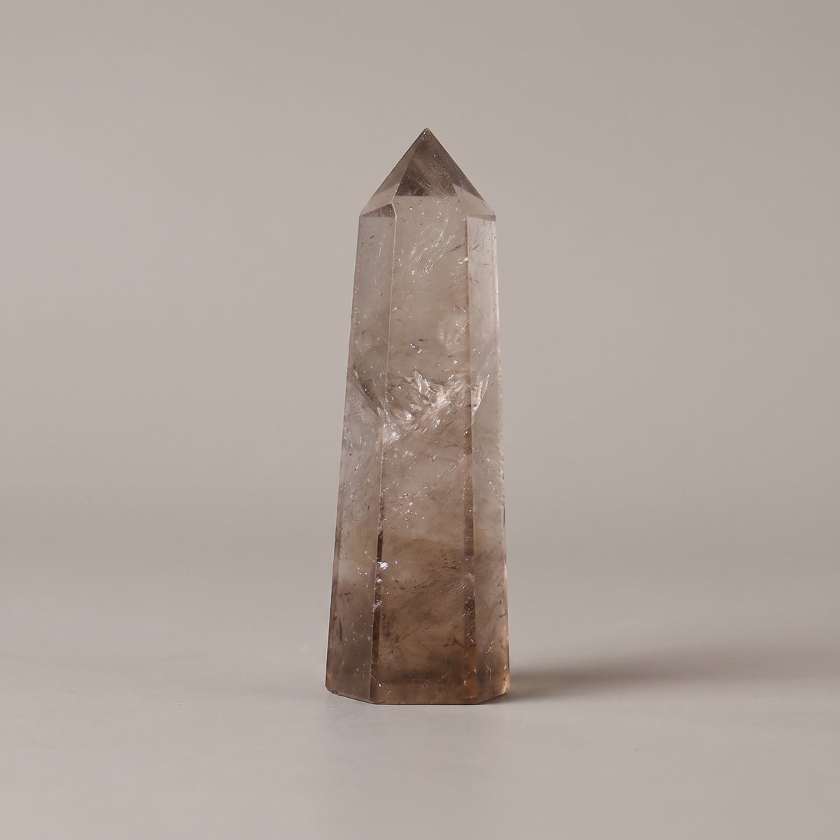 Polished smoky quartz crystal tower