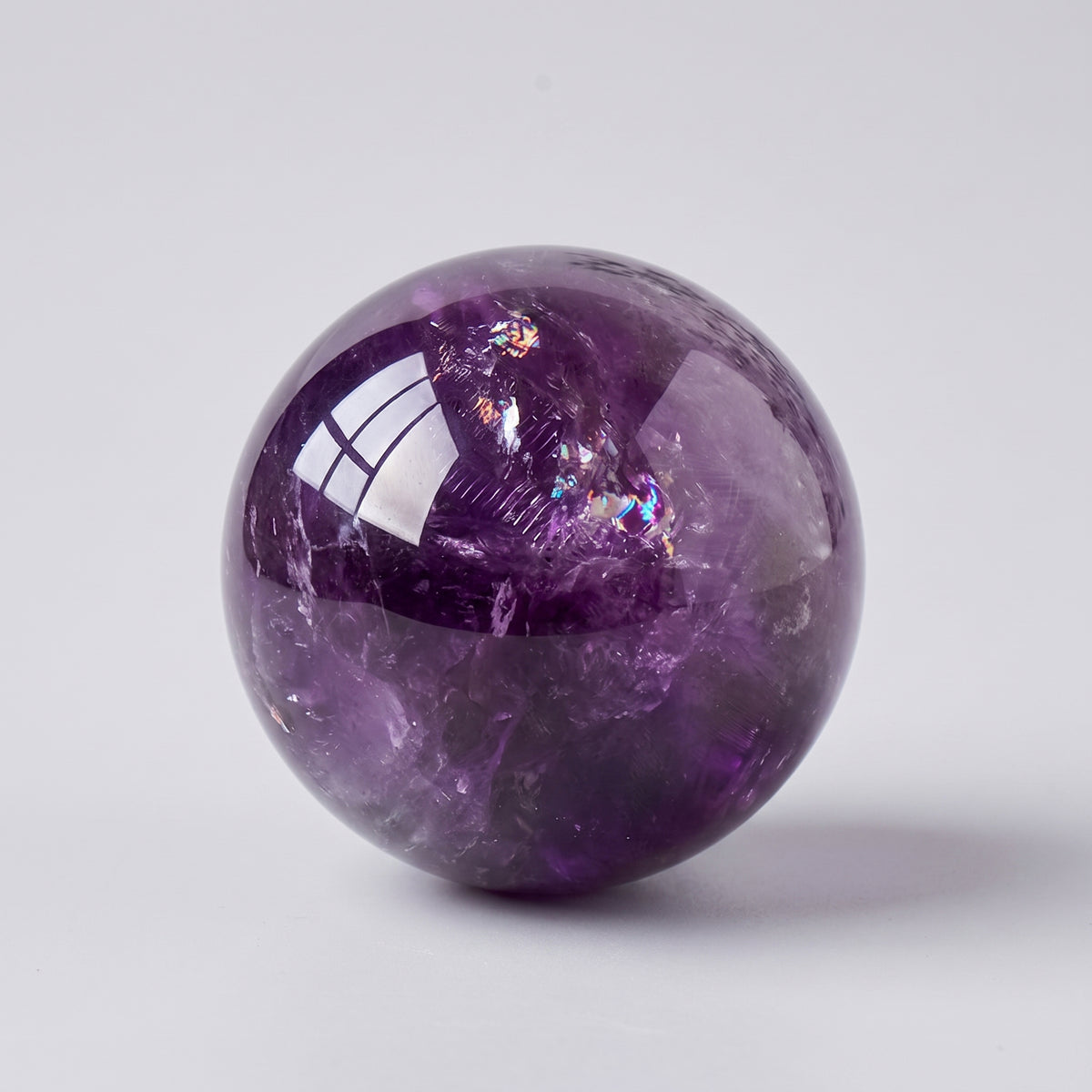 Polished amethyst crystal sphere